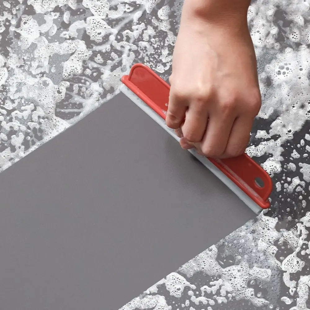 Durable silicone squeegee for fast and easy mirror cleaning.