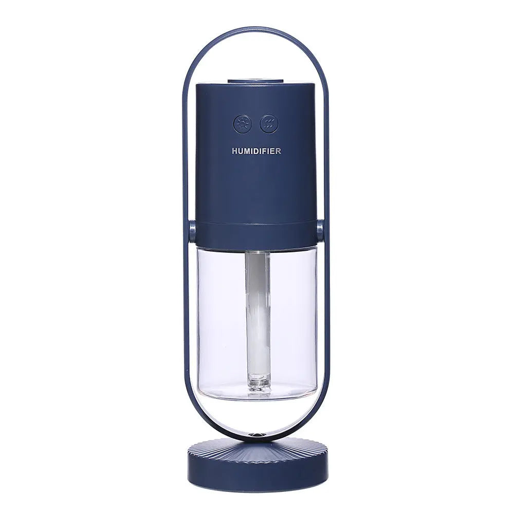 Blue humidifier with clear water tank on a white background