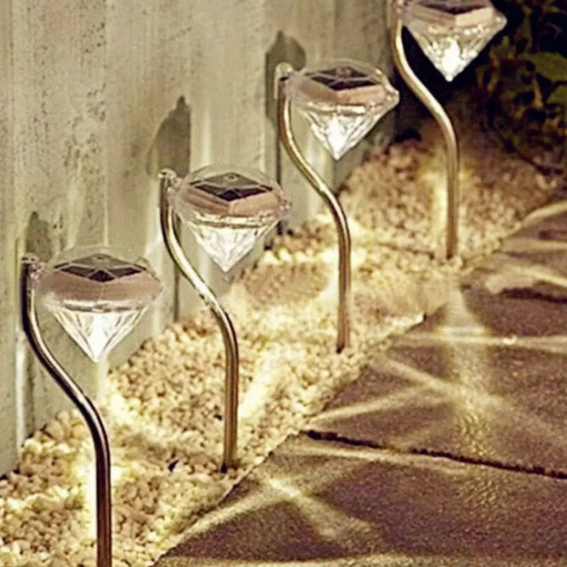 Solar-powered garden diamond light, available in white or multicolor, ideal for outdoor, yard, and fence decoration, IP55 waterproof, energy-efficient