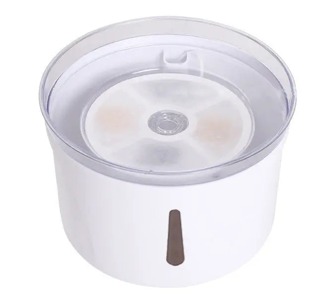 Top-down view of the automatic pet water fountain showing filter mechanism

