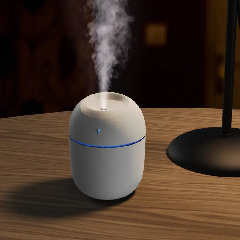 USB-powered mini humidifier in white, pink, and green – quiet 220ml ultrasonic diffuser for office desk or car