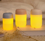 Mini USB humidifier in white with cylindrical design for air moisturizing
